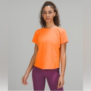 Orange Lululemon top, worn once, perfect condition